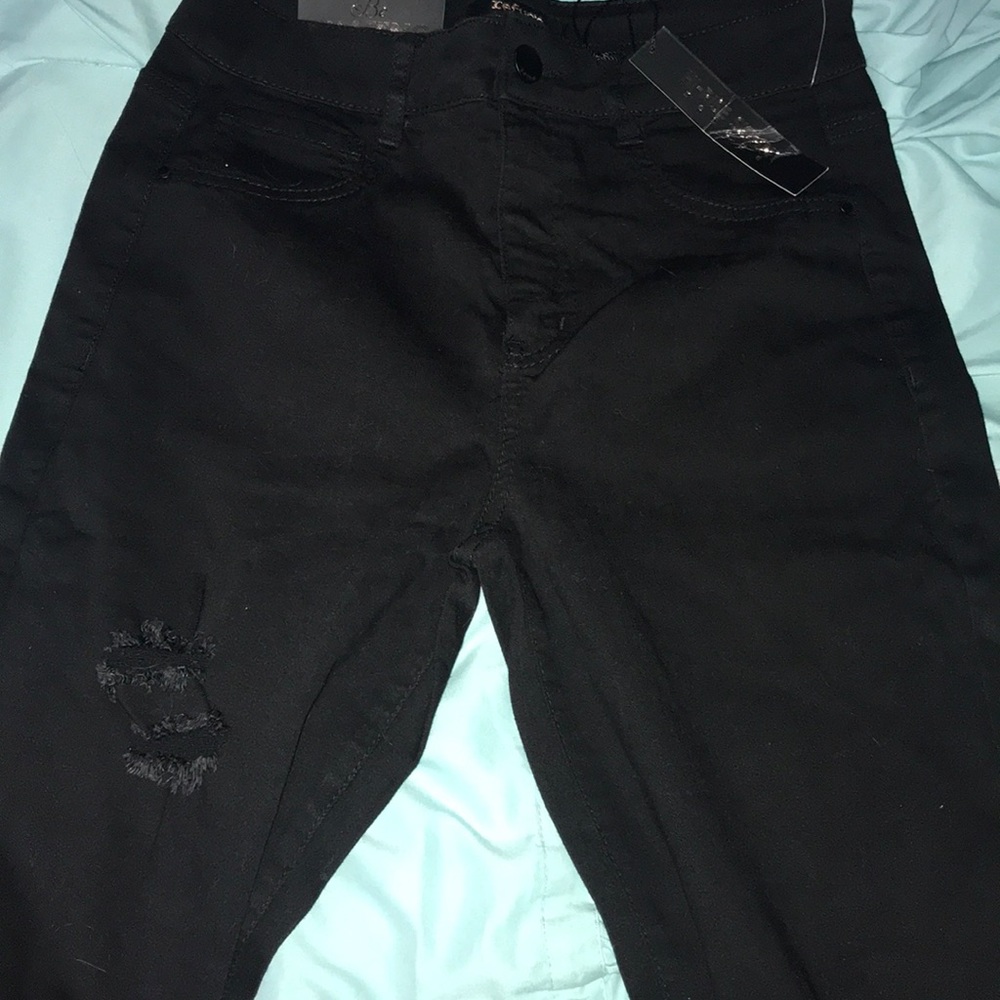 Ripped black skinny jeans size 8